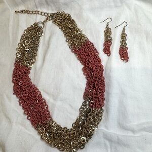 Necklace and matched earrings. Gold-tone links with coral accent.